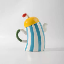 Ceramic waist-handle teapot for serving tea and cold drinks