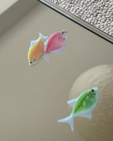 Ocean fish mirror wall art with marine-inspired fish and shell motifs