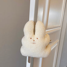 Plush cat door stop for a child’s room or nursery