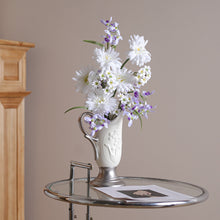 French embossed ceramic vase with floral relief detailing in silver