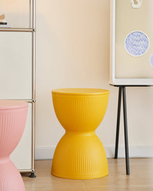Rainbow stripe plastic stool in yellow for home seating