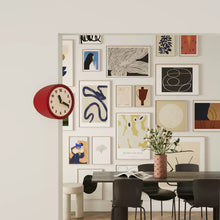 Red corner clock with dot dial for decorative home styling
