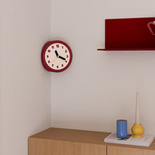 Red corner wall clock with minimalist dots dial for a 90-degree wall edge