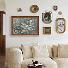 Set of eight vintage-inspired botanical, portrait, and landscape wall art pieces in assorted frames