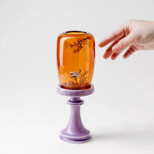Chinese-inspired red glass and ceramic candle holder for tealights