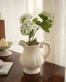 Vintage ceramic teapot vase with curling handle and fluted body