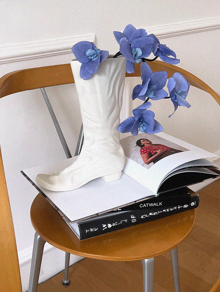 Boot-shaped ceramic flower vase for decorative home styling