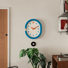Vintage blue wooden wall clock with pendulum for home decor