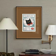 Vintage cat poster wall art featuring a feline in a ruffled collar with a red polka-dot bow