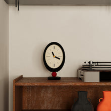 Retro oval wooden desktop clock with red sphere base in black