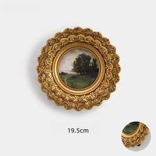 Set of eight vintage-inspired botanical, portrait, and landscape wall art pieces in assorted frames