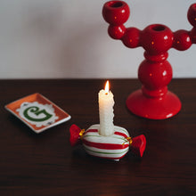 Ceramic Christmas candle holder with festive holiday design