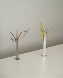 Minimalist stainless steel bud vase for modern tabletop decor