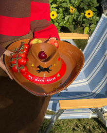 Cowboy hat-shaped ceramic snack tray with built-in dip bowl and horse motif
