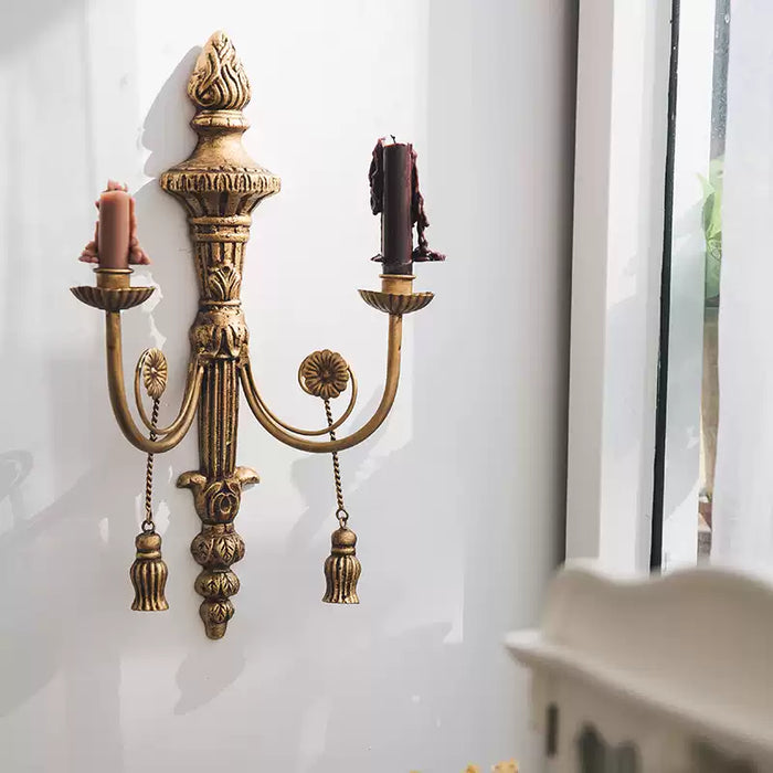 Vintage French-style iron wall candle holder with ornate detailing