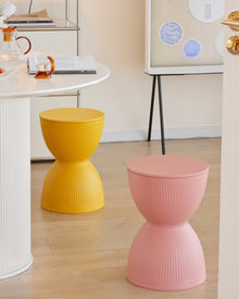 Rainbow stripe plastic stool in yellow for home seating