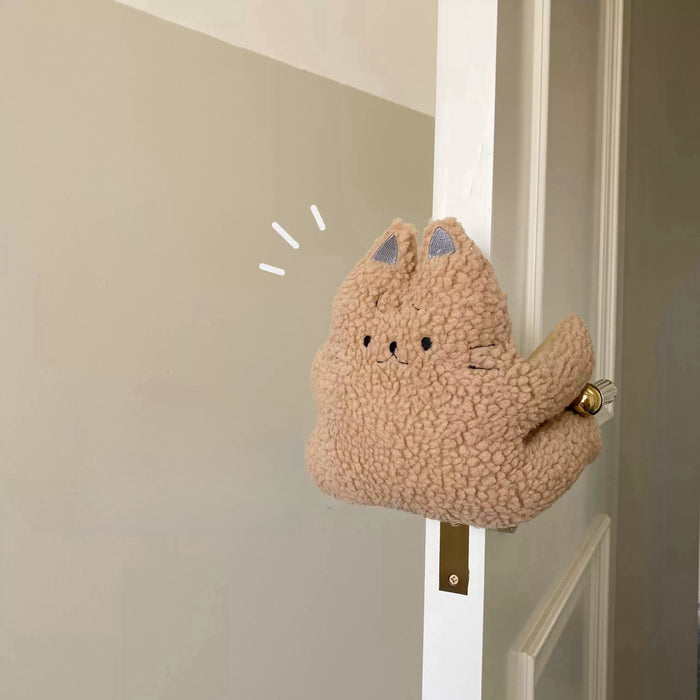 Plush cat door stop for a child’s room or nursery