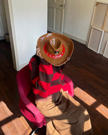 Cowboy hat-shaped ceramic snack tray with built-in dip bowl and horse motif