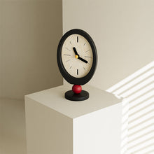 Retro oval wooden desktop clock with red sphere base in black