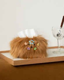 White fluffy dog tissue box cover with decorative bow clips