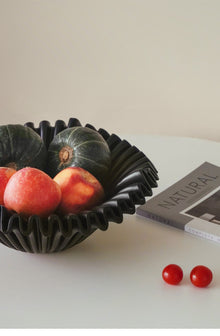 Black resin wave fruit tray for serving fruit, snacks, or decorative accents