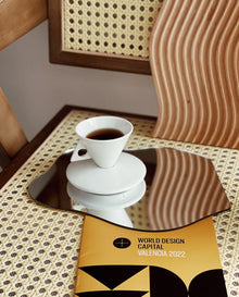 Triangular ceramic espresso cup with matching saucer
