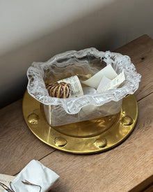 Smoky glass storage bowl with textured finish and wavy rim