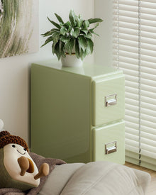Matcha green narrow bedside cabinet with two drawers and metallic handles