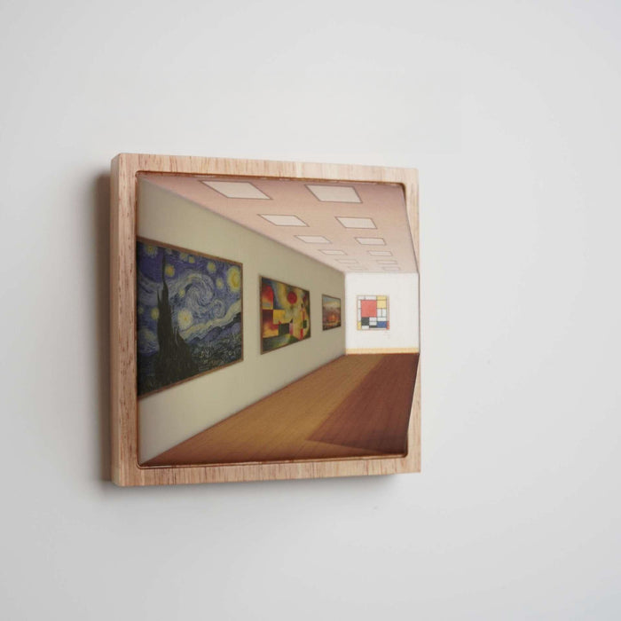 3D gallery wall lamp with art-inspired design and cordless rechargeable LED lighting