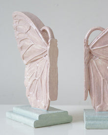 Butterfly resin bookend decor with sculptural wing design