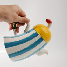 Ceramic waist-handle teapot for serving tea and cold drinks