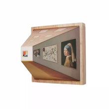 3D gallery wall lamp with art-inspired design and cordless rechargeable LED lighting
