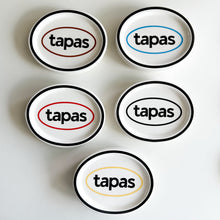 Black oval ceramic tapas plate with graphic text design