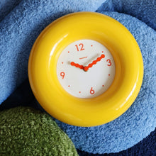 12-inch red bagel-inspired wall clock with minimalist dial