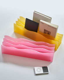 Bright blue wave acrylic magazine organizer for books, tablets, and desk essentials