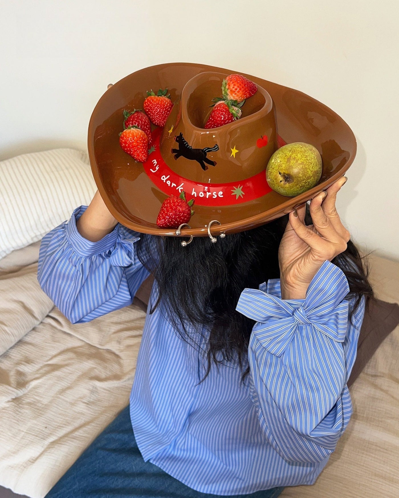 Cowboy hat-shaped ceramic snack tray with built-in dip bowl and horse motif