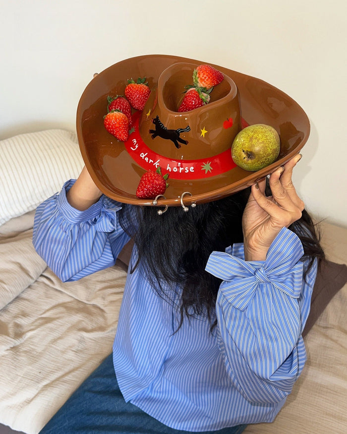 Cowboy hat-shaped ceramic snack tray with built-in dip bowl and horse motif