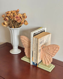 Butterfly resin bookend decor with sculptural wing design