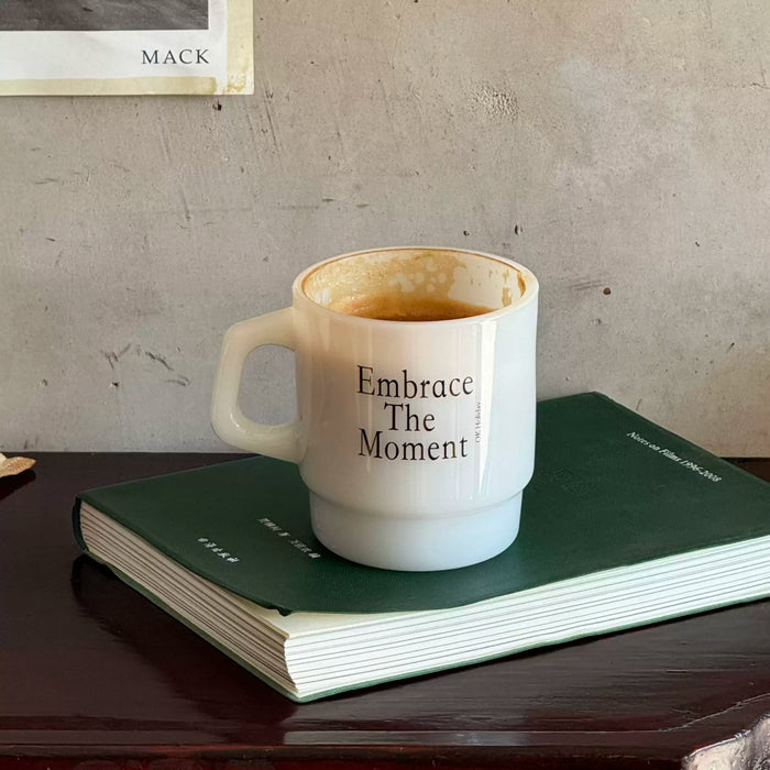 Vintage jade glass coffee mug with handle and printed Embrace The Moment text