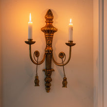 Vintage French-style iron wall candle holder with ornate detailing