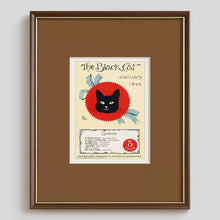 Vintage cat poster wall art featuring a feline in a ruffled collar with a red polka-dot bow