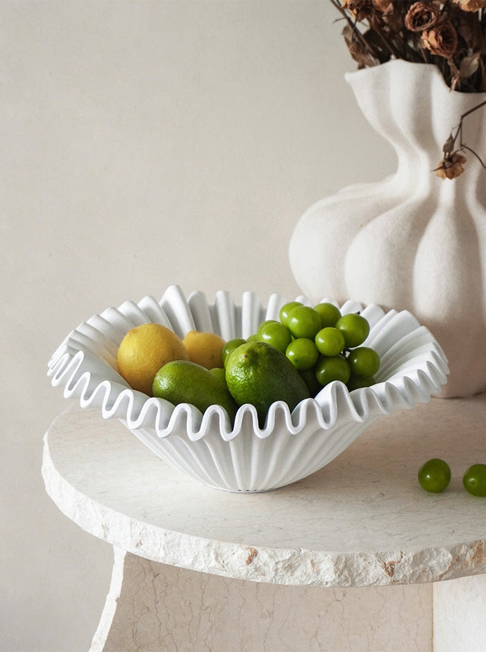 Black resin wave fruit tray for serving fruit, snacks, or decorative accents
