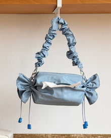 Baby blue candy-shaped nylon tissue holder bag with drawstring design