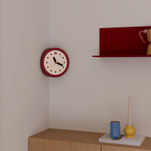 Red corner wall clock with minimalist dots dial for a 90-degree wall edge