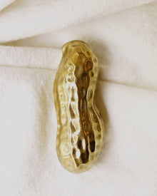 Peanut-shaped brass aroma box with refillable ceramic scent stones