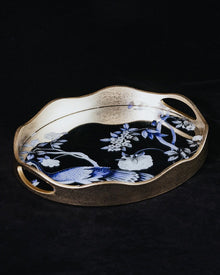 Peacock mirror decorative tray with floral motif and gold-toned wavy frame
