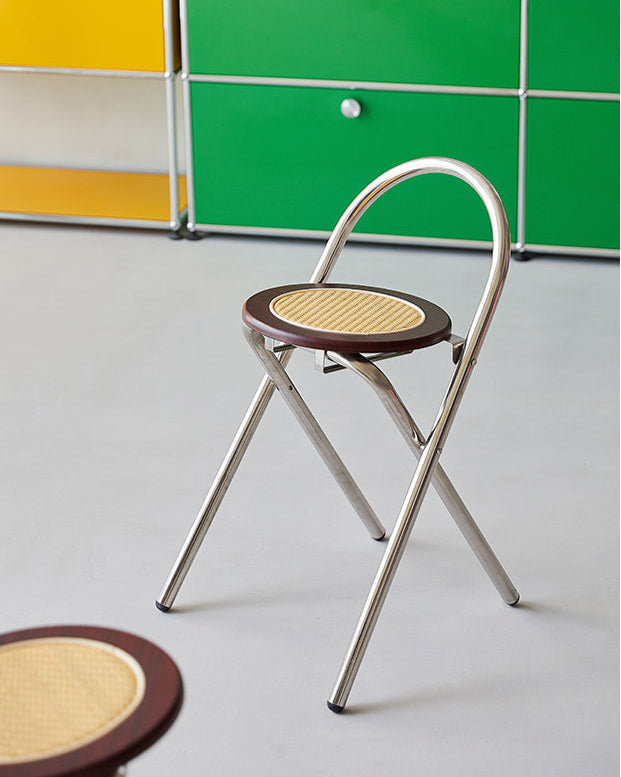 French-inspired walnut rattan folding stool with woven seat