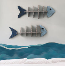 Fish-shaped wall shelf with multi-level display storage
