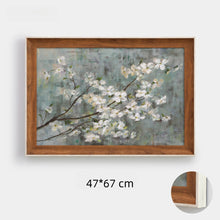 Set of eight vintage-inspired botanical, portrait, and landscape wall art pieces in assorted frames