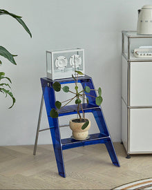 Grey foldable acrylic and metal ladder side table for small spaces